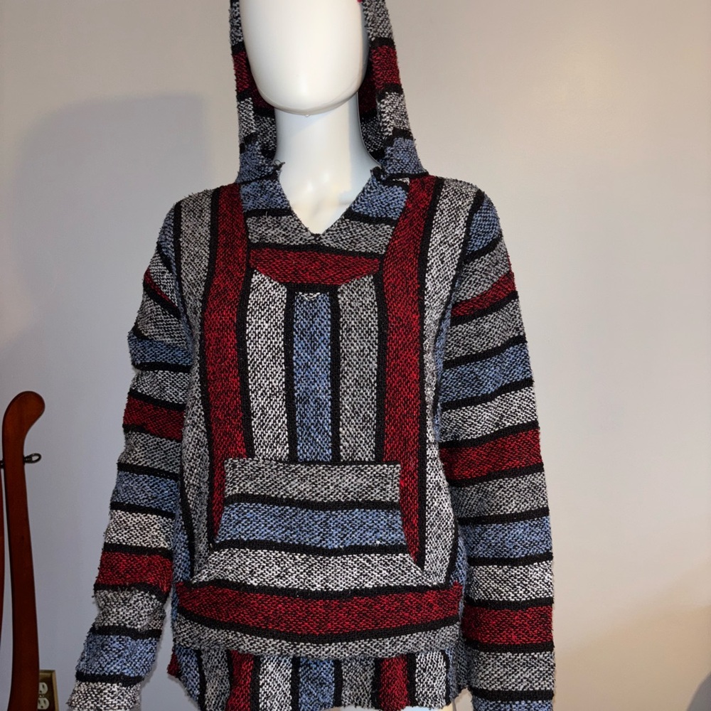 Vibrant Red and Blue V-Neck Baja Sweater with Geometric Stripes